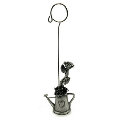 Picture holder with base made of pewter shaped as a watering can with roses inside ph2
